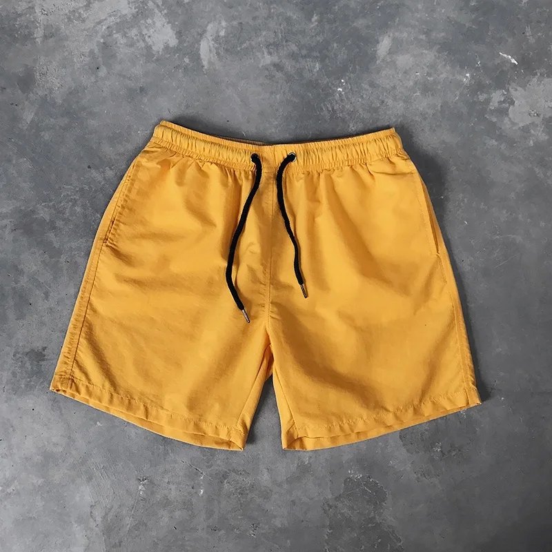 Pantaloncini da spiaggia da uomo in seta di ghiaccio pantaloncini sportivi estivi traspiranti leggeri colore caramella Surf nuoto pantaloncini