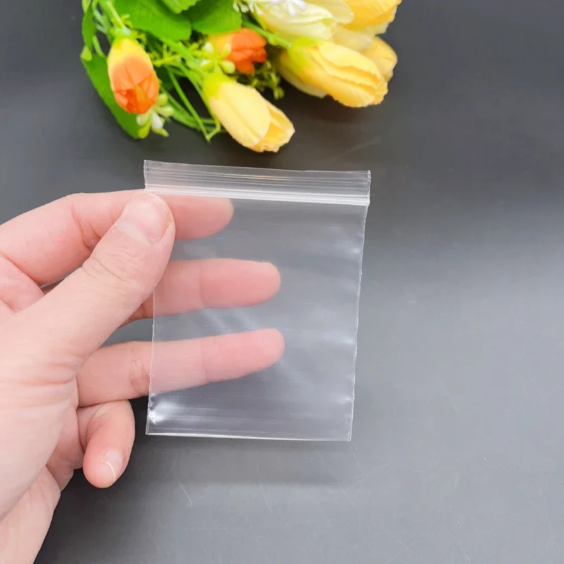 1000 ชิ้นถุงพลาสติกใสถุง Ziplock นํากลับมาใช้ใหม่ถุงของขวัญสีขาวสําหรับเครื่องประดับงานแต่งงานถุงบรรจุภัณฑ์ Reclosable Mini กระเป๋าเก็บ