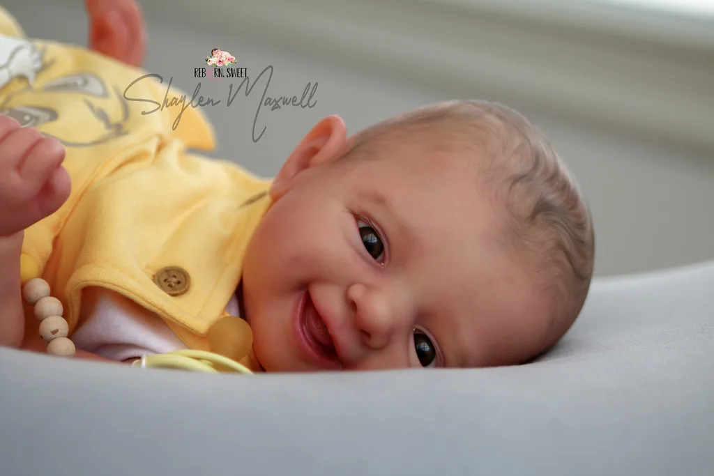 19 Inch McKinli Reborn Doll Kit Smiling Lifelike Unpainted Unfinished Baby Doll Parts with Cloth Body for Collectors