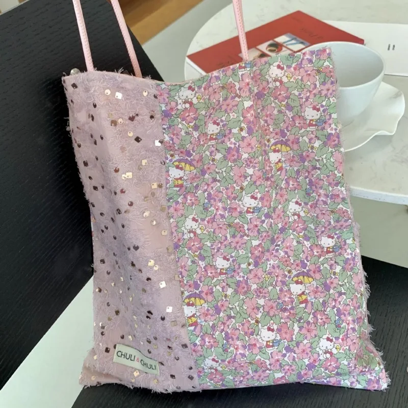 Tas kanvas desain Niche payet merah muda Hello Kitty Kawaii Sanrio tas kanvas tas komuter tas bahu tunggal kelas atas untuk wanita