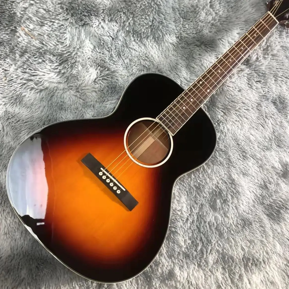 

ooo series solid wood section 39 "glossy finish refers to acoustic guitar