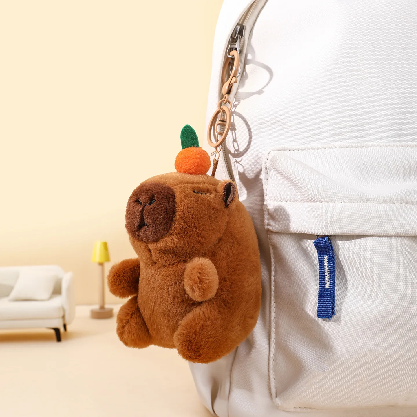 Urocza pluszowa zabawka wydra rzeczna dla niemowląt, antystresowa, dmuchająca bańki, potrząsająca się i wydająca dźwięki, zawieszka do kluczy na przyjęcie urodzinowe.