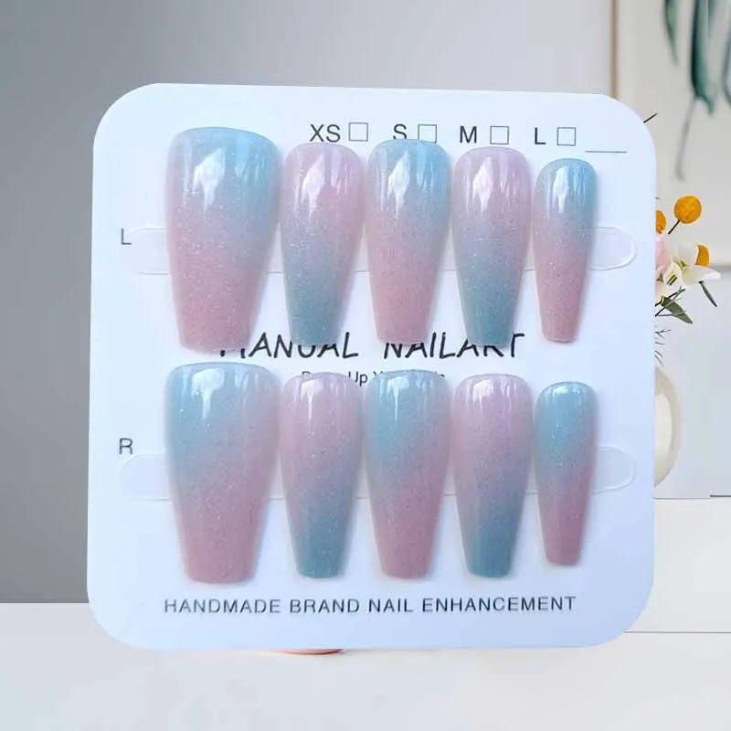 แผ่นแปะเล็บปลอมทรงหยดน้ำยาว 10 ชิ้น สีชมพูอ่อนไล่ระดับสีม่วงทอง ลายตาแมว