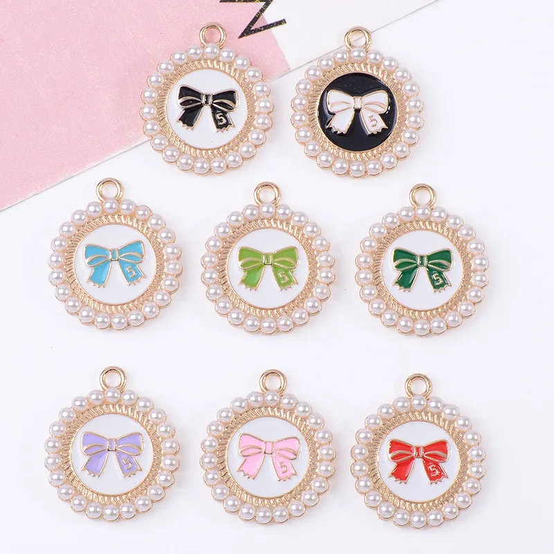 

100Pcs sets spot wholesale bow pearl round flower plate small pendant fashionable sweet hair accessories earrings and access