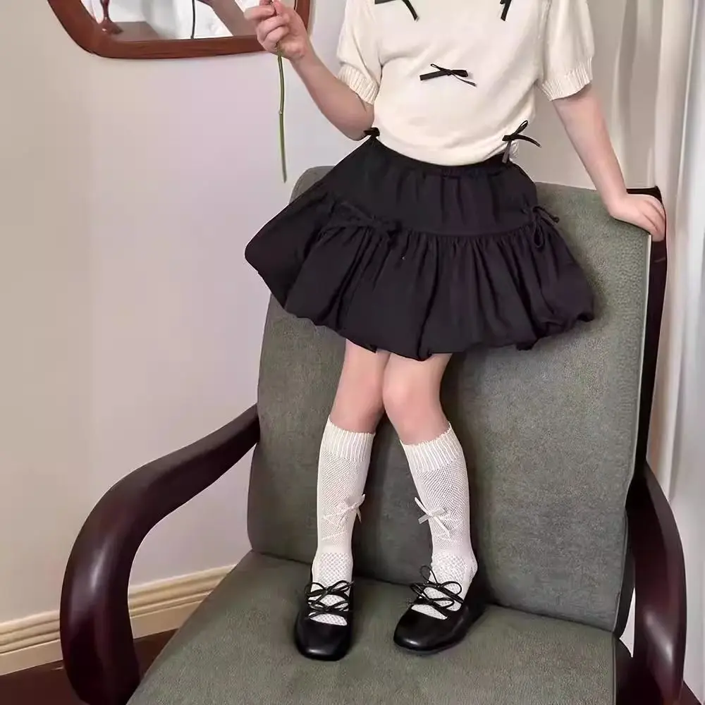 女の子の花のつぼみ半身スカート 2025 夏の新しいトレンディな子供の甘くてかわいいリボンショートスカート