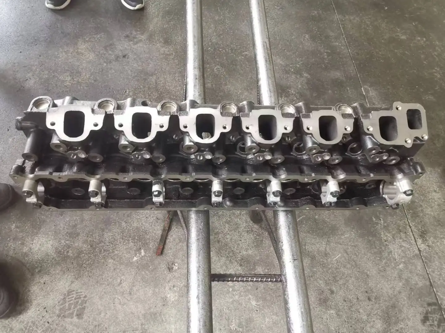 OEM 1HD-FT 24V Complete Iron Casted Engine Cylinder Head for  Land Cruiser Model 1HDFTE 11101-17040 New Condition