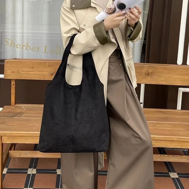 

Retro Suede Leather Integrated Single Shoulder Bag 2026 New Ladies Handbag Casual Large Capacity Shopping Bag