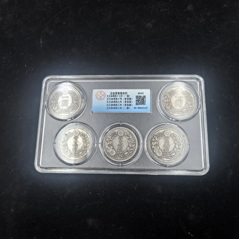 

Антикварный набор из пяти серебряных монет в коробке, серия «Японский торговый доллар», с серебряным покрытием из чистой меди, коллекционные, с оценкой