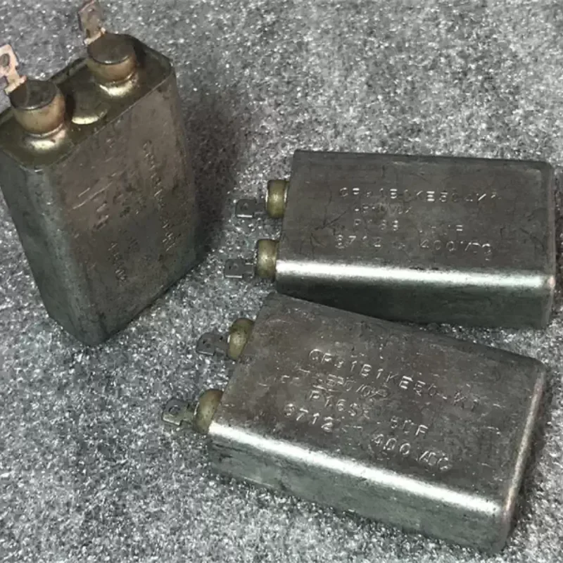 

Антикварная американская машина для желчного пузыря AEROVOX 0,5 мкФ 400 В с медным корпусом, связанная с бесконечным конденсатором, погружным маслом