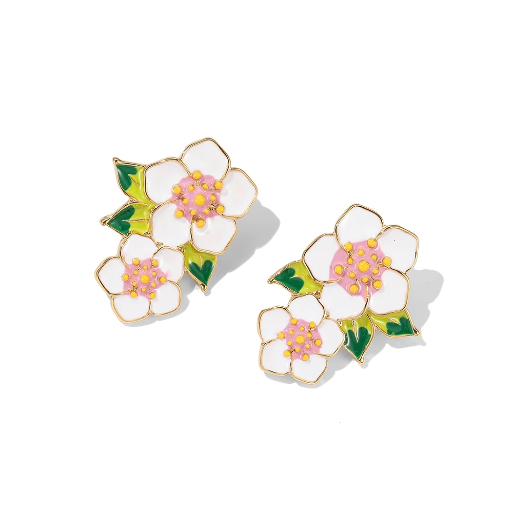 

Original design enamel glaze white flowers green leaf earrings elegant temperament hand-painted earrings gold-plated jewelry.