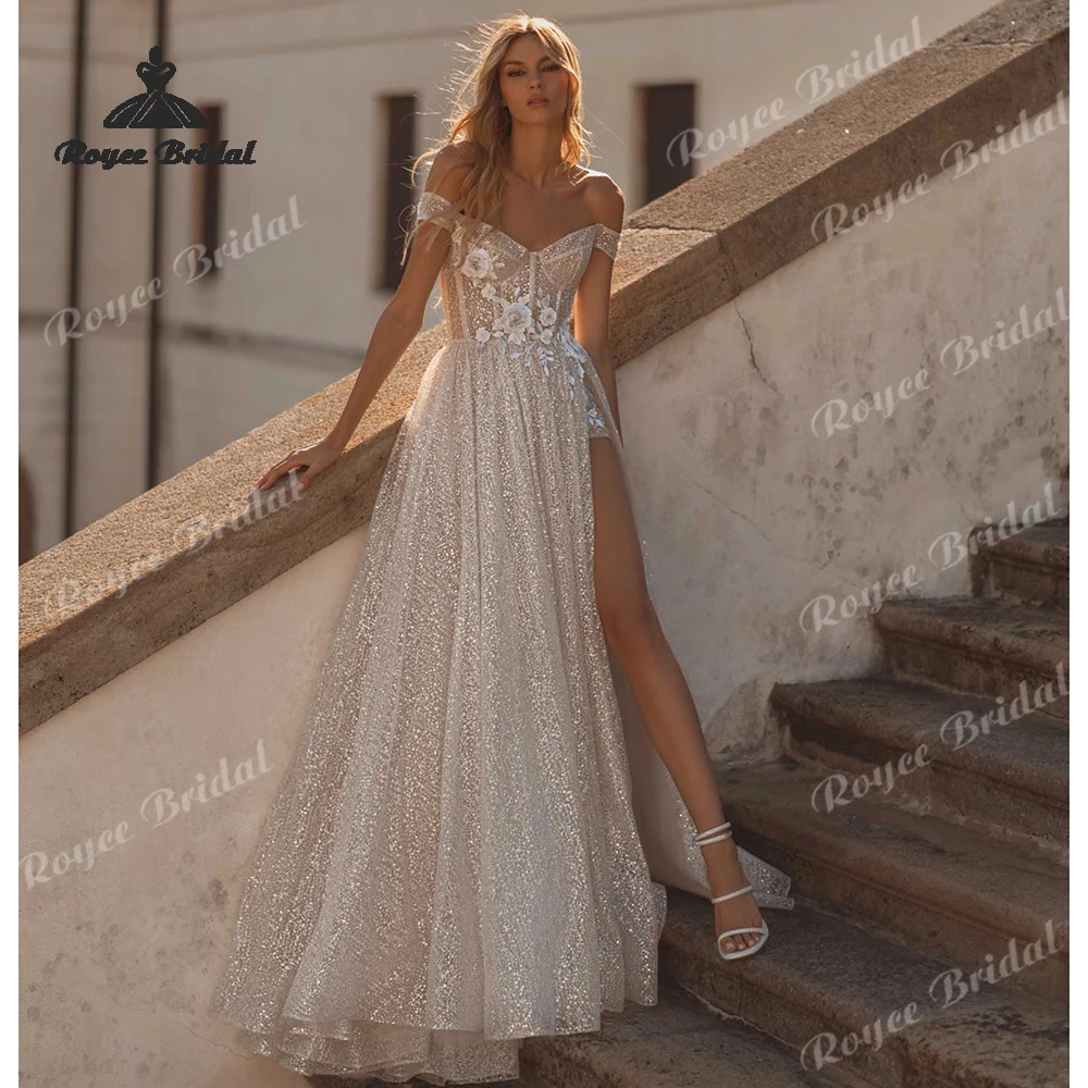 

Glitter 3D Flowers Appliques A Line Wedding Dresses 2026 Off Shoulder Customized Beach Bridal Gown Custom vestido de novia