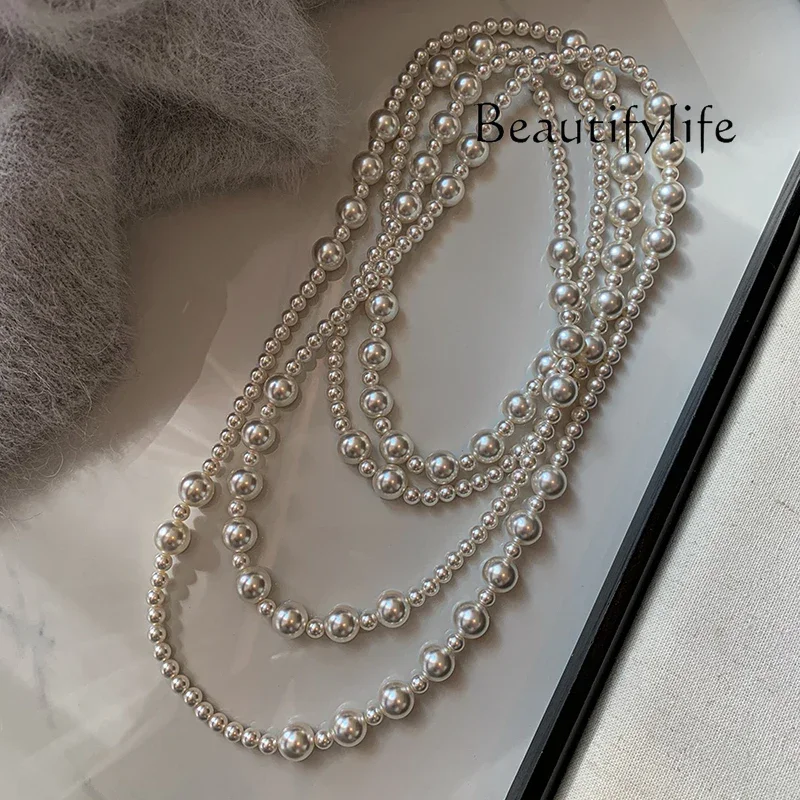 

White long pearl necklace women's sweater chain high-end new double-layer multi-layer stacked neck chain