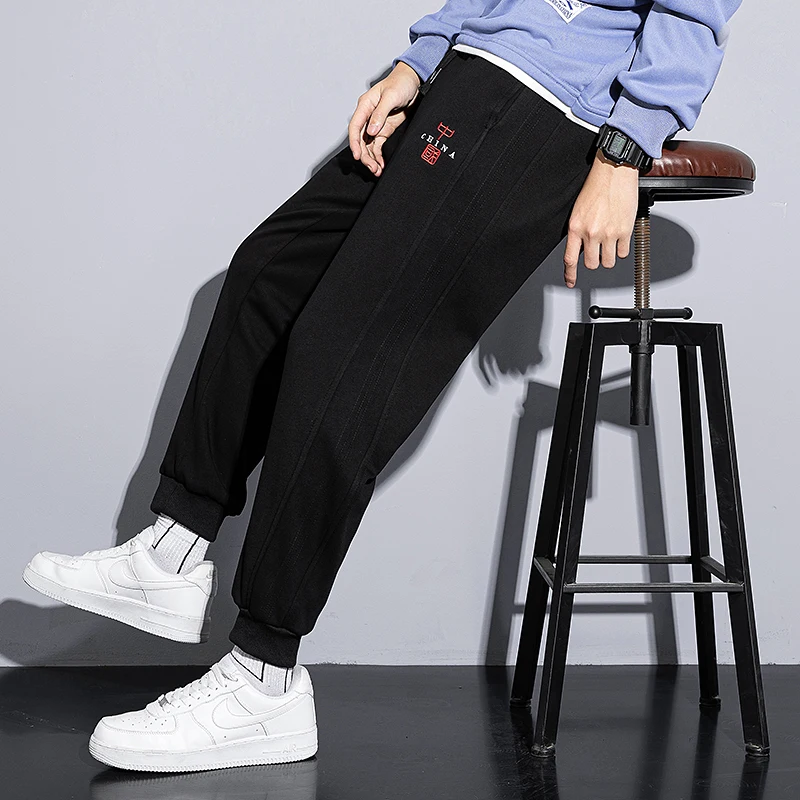 Trendy Brand Fashion Spring and Autumn Men's Elastic Waist Solid Embroid Pockets Casual Loose Bound Feet Ankle Length Pants