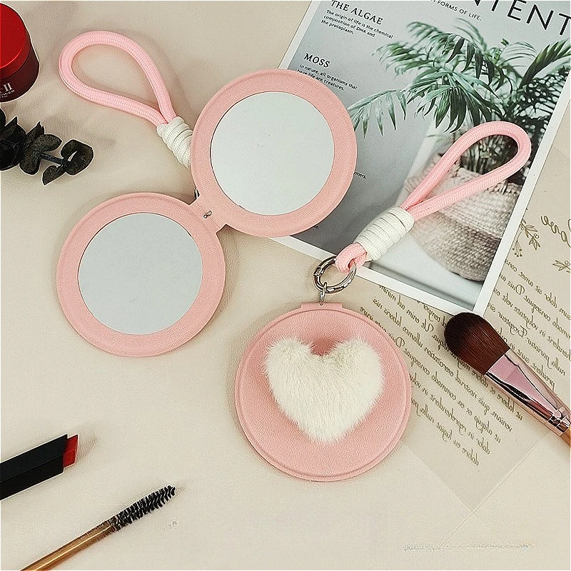 مرآة بوم بوم على شكل قلب من جلد البولي يوريثان مقاس 85 ملم قابلة للطي على الوجهين ومحمولة