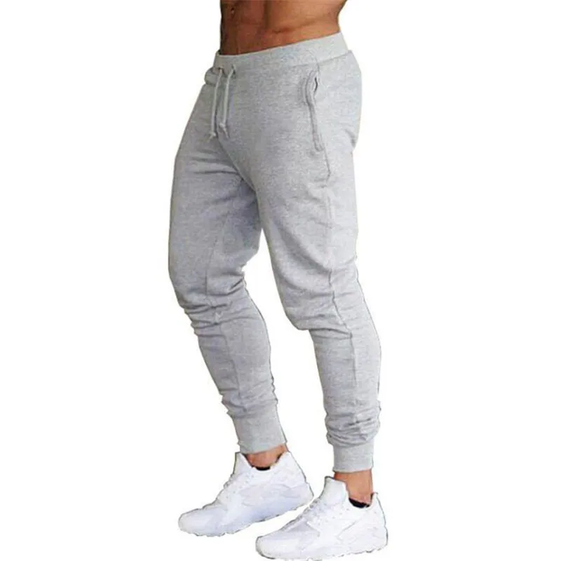 Męskie spodnie sportowe długie spodnie spodnie do joggingu boczne kieszenie elastyczne wygodne i ciepłe sportowe jednolity kolor slim fit casual