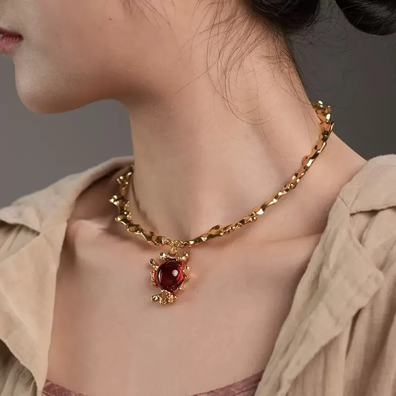 

Romantic Vintage Artisan Textured Gold Necklace, Irregular Weave Design with Round Red Glass for Special Occasions