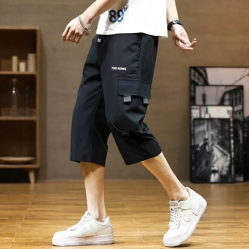 

Американская рабочая одежда в стиле ретро, мужские модные свободные прямые брюки Haome на семи футов, летние тонкие повседневные брюки со средним кошком