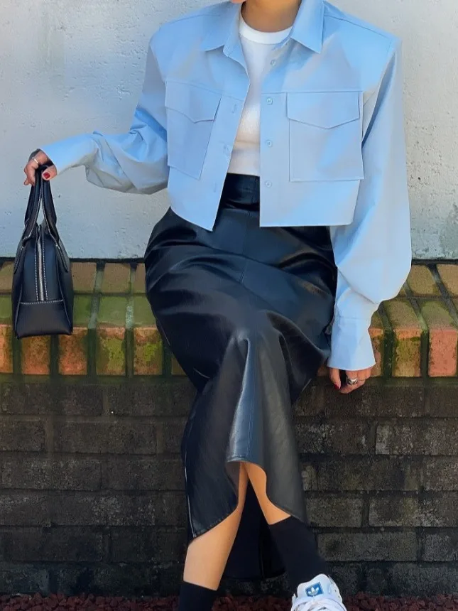 الرجعية عالية الخصر مطاطا بولي Leather الجلود f تنورة للنساء Bla التخسيس منتصف طول شق تنورة Ci تخفيف ألف خط تنورة