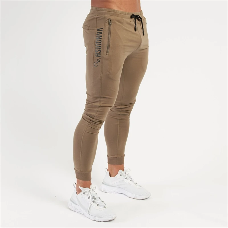 Pantaloni slim neri in cotone abbigliamento da strada pantaloni casual da uomo jogger palestra tasca con cerniera pantaloni sportivi da allenamento