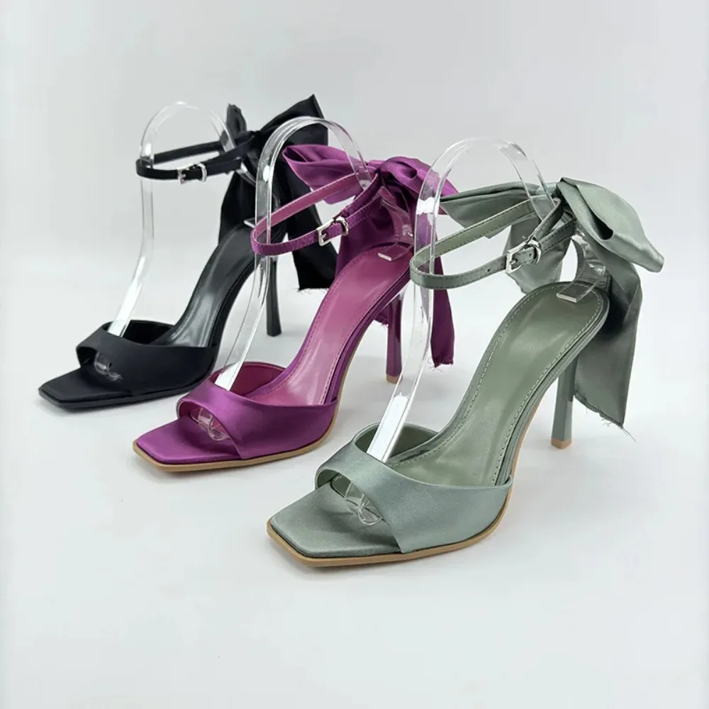 

2026 Women Elegant Glossy Satin Big Back Bow Ankle Buckle Open Square Toe Stiletto Sandals Wedding Evening Party Dating Occasion