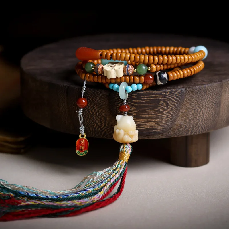 Nuclear-shaped olive pit bracelet, handcrafted gold rice bowl design unisex jewelry