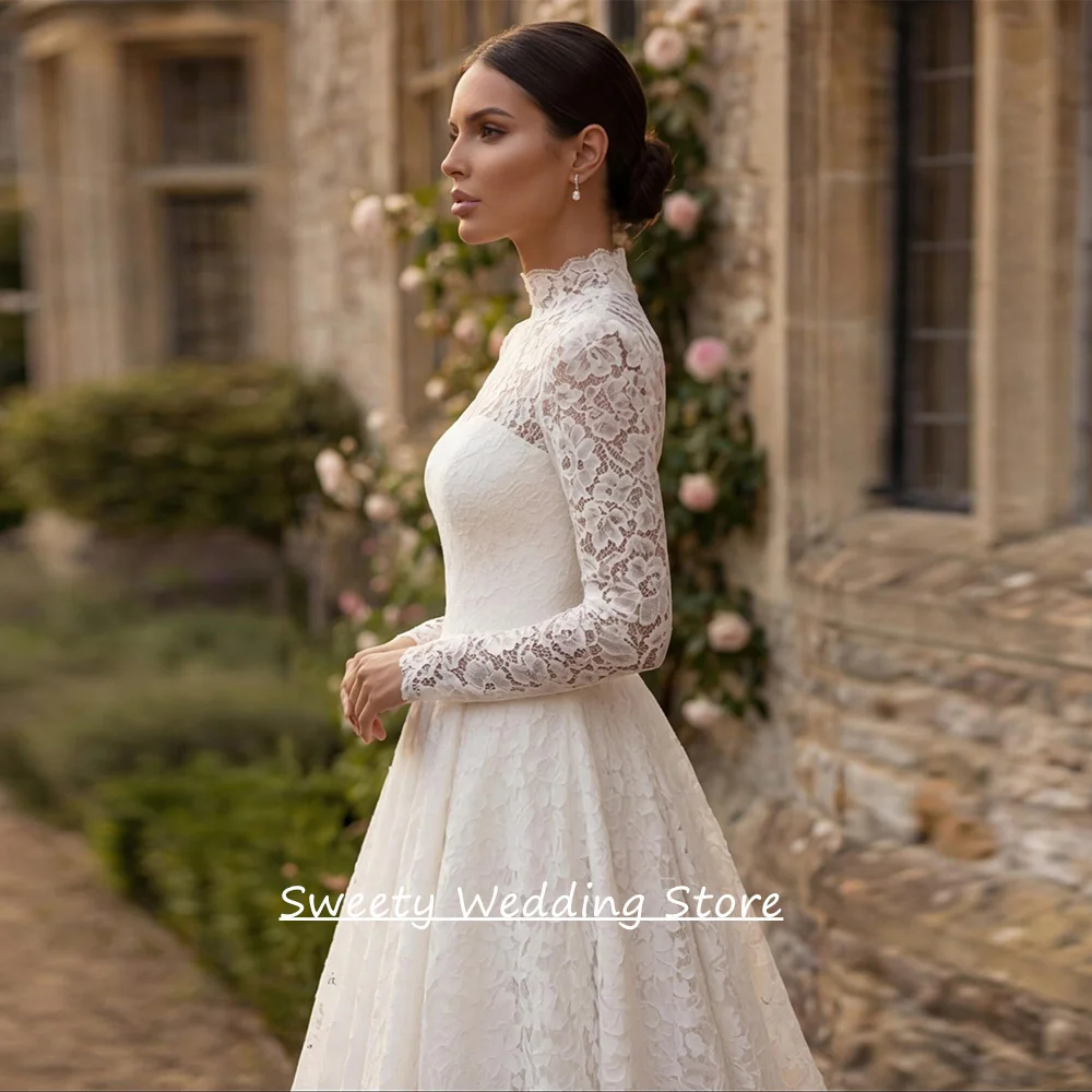 فستان زفاف عربي مخصص بأكمام طويلة ورقبة عالية دانتيل رائع سويب تراين فستان زفاف على شكل حرف A فيستدو دي نويفا