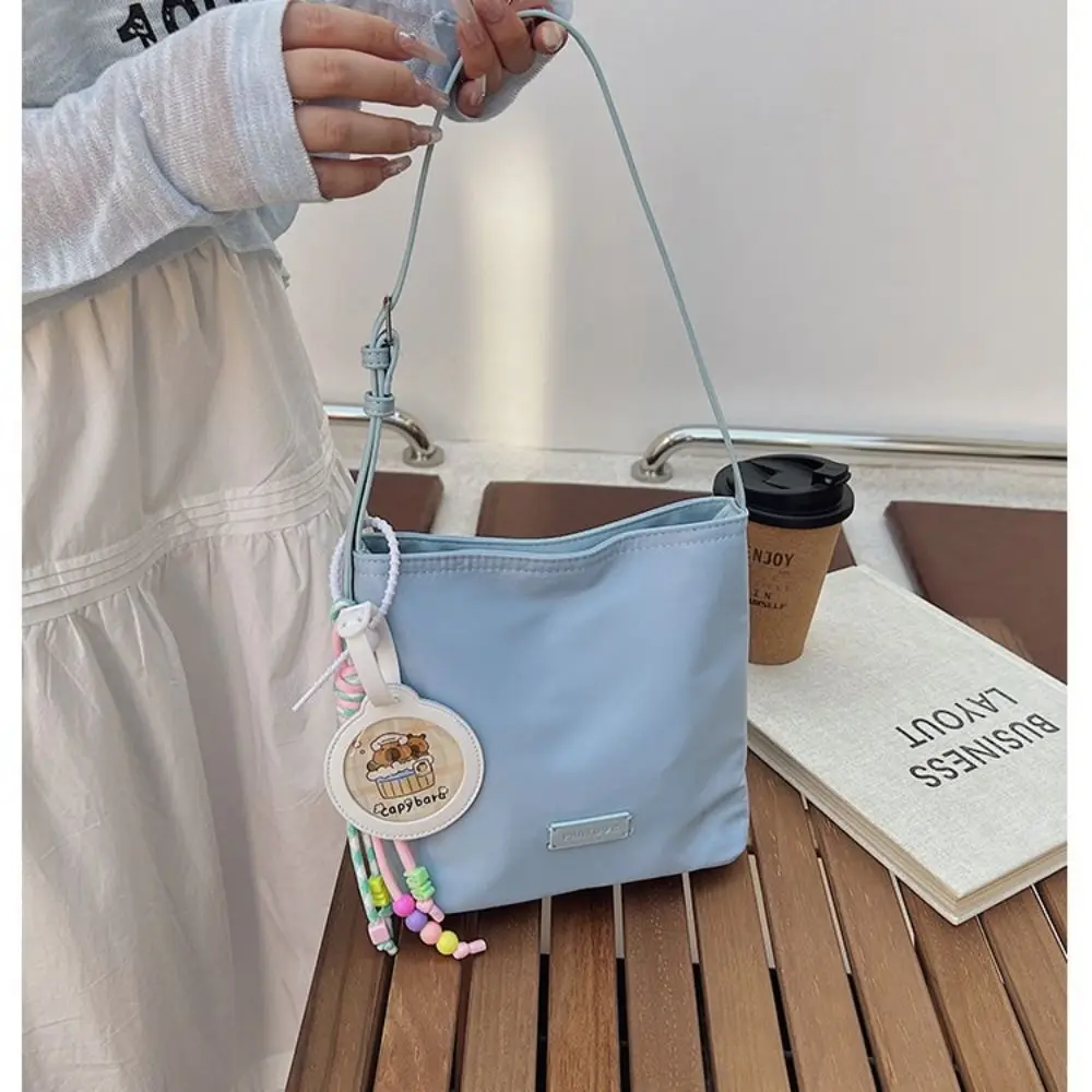 

Универсальная нейлоновая большая сумка в корейском стиле, однотонная сумка для подмышек, большая вместительная универсальная сумка на плечо для женщин