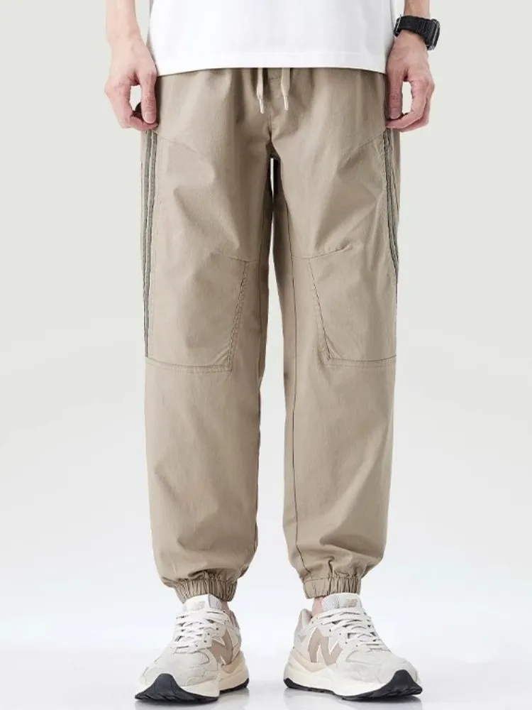 Pantalones informales para hombre, novedad de verano, pantalones holgados hasta el tobillo con cordón, moda de venta al por menor de Hip Hop, pantalones de chándal Cargo a rayas