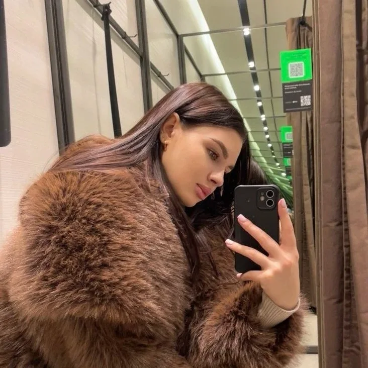 Elegante winter dames nepbontjas pluizige reverskraag oversized eco bontjas voor dames ontworpen kunstbontjas voor dames