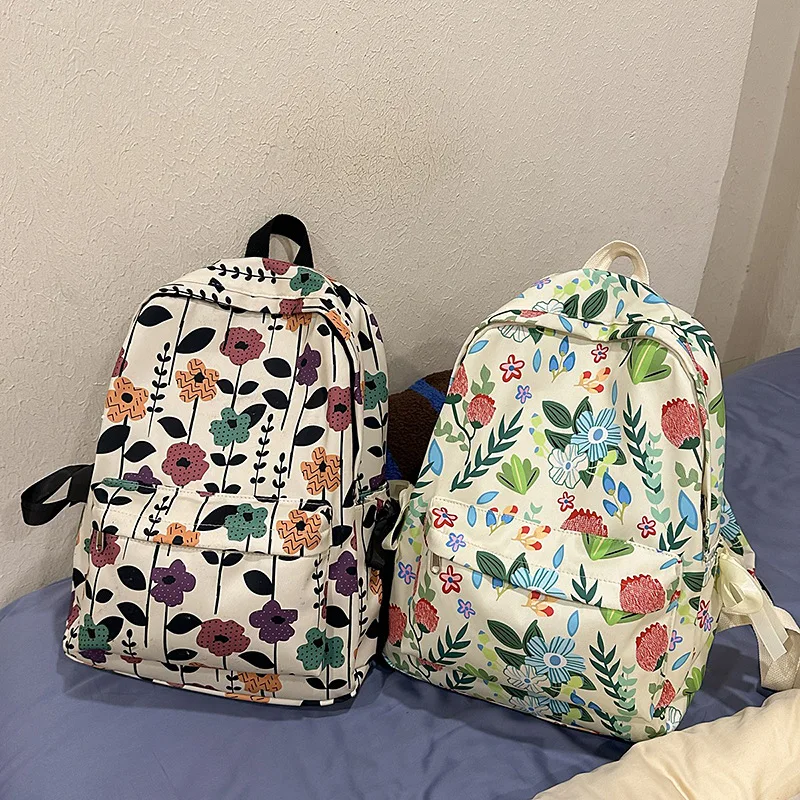 

Beige Floral Print Casual Backpack with Colorful Flower Pattern Water Resistant Fabric Suitable for Teenage Girls Daily School