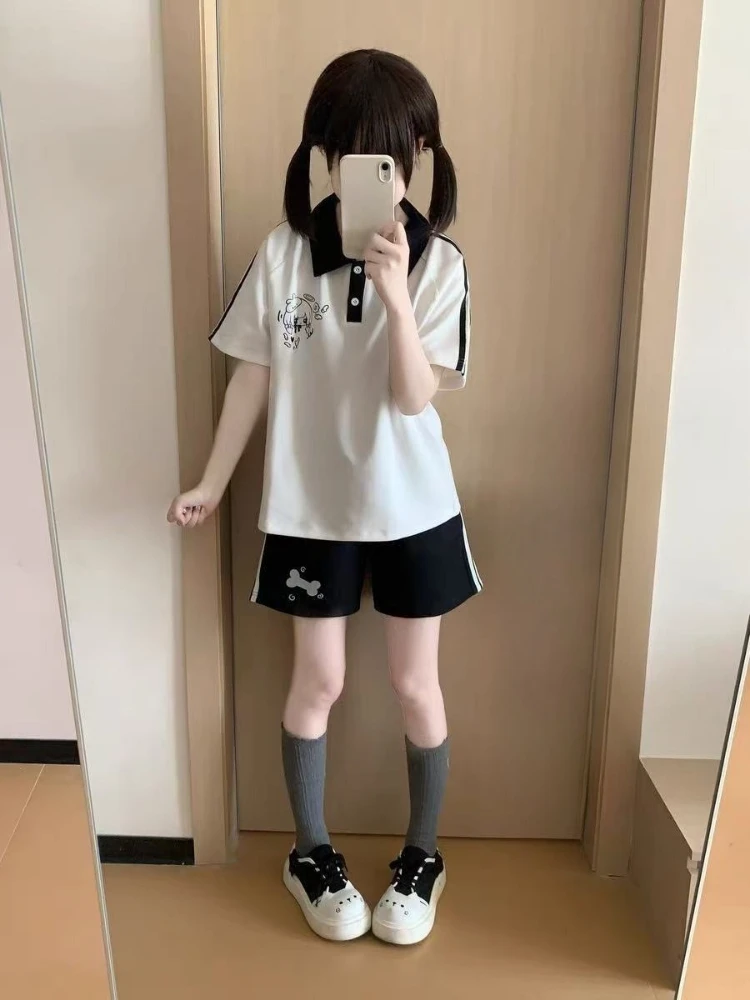 การ์ตูนญี่ปุ่นพิมพ์ Kawaii 2 ชิ้นชุดเสื้อยืด + กางเกงขาสั้นสีดําผู้หญิง Contrast สีฤดูร้อน Y2K ความงาม Fairy Grunge ชุด