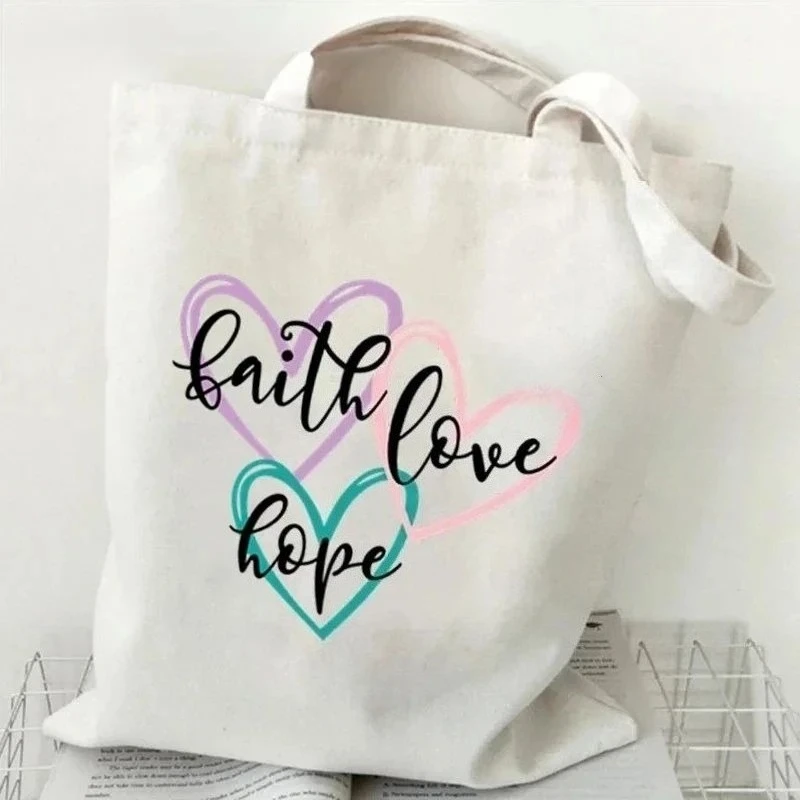 حقائب تسوق عصرية غير رسمية حقيبة تخزين حقيبة يد هدايا مسيحية الإيمان مطبوعة رسومات القلب المرأة قماش حقيبة كتف