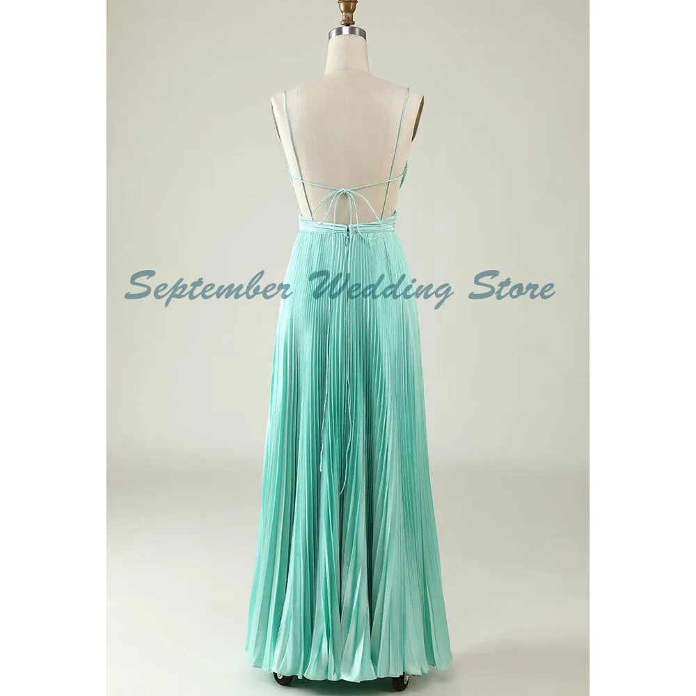 Abiti da festa da sera senza schienale senza maniche eleganti verdi con cinturino per spaghetti Pieghevoli abiti da ballo lunghi fino al pavimento di alta qualità