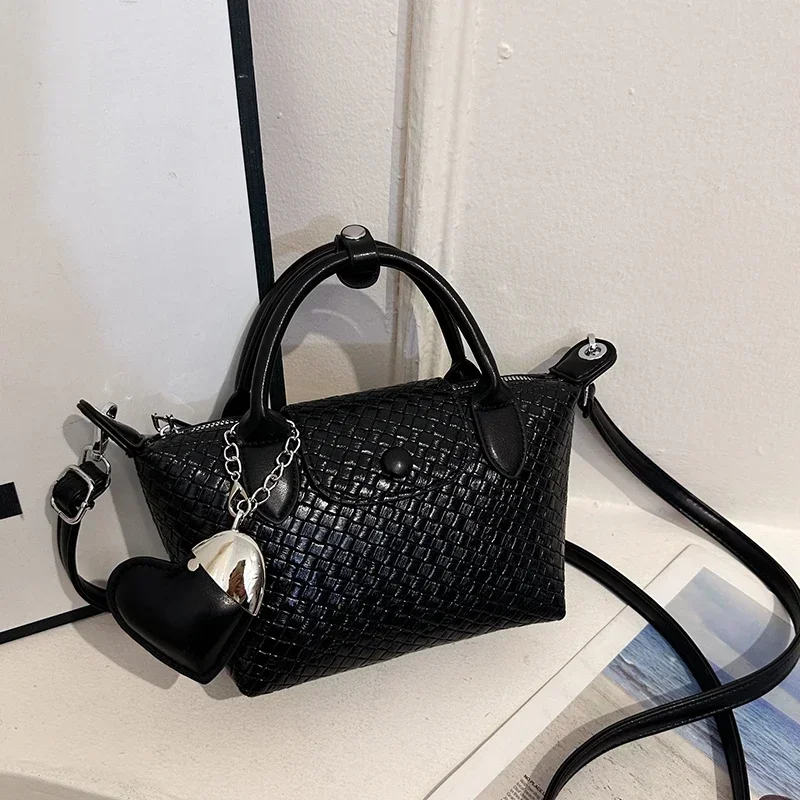 

Элегантная женская кожаная сумка через плечо - классический стиль-мессенджер через плечо, популярный для повседневного использования