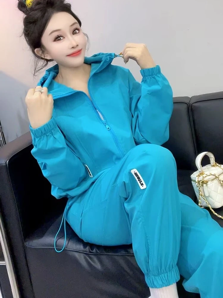 

Fashion casual sports suit women's summer new sunscreen suit quick drying hooded jacket leg binding pants two-piece set