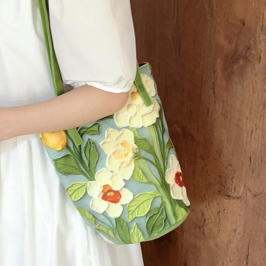 2025 تصميم جديد الأزهار دلو حقيبة المرأة الكتف Crossbody النفط اللوحة زهرة تصميم عارضة أزياء سعة كبيرة حمل حقيبة