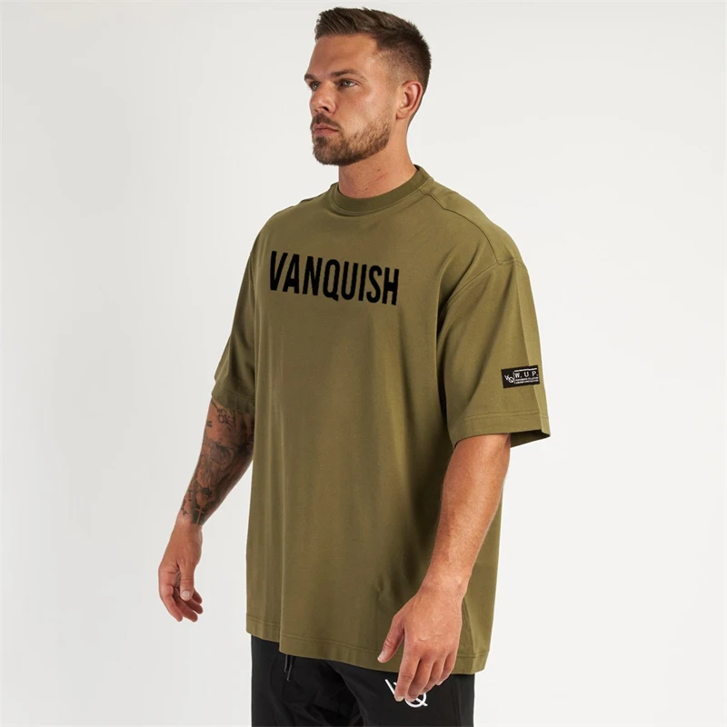 Camiseta holgada de manga corta para hombre, ropa deportiva de algodón con cuello redondo, informal, a la moda, para hacer ejercicio en el gimnasio,