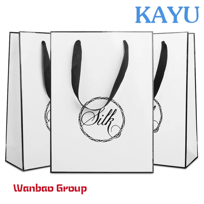 Custom  Custom Printed Logo Luxury sac en papier Matt Black Shopping Paper Gift Bags Packaging With Ribbon Handle