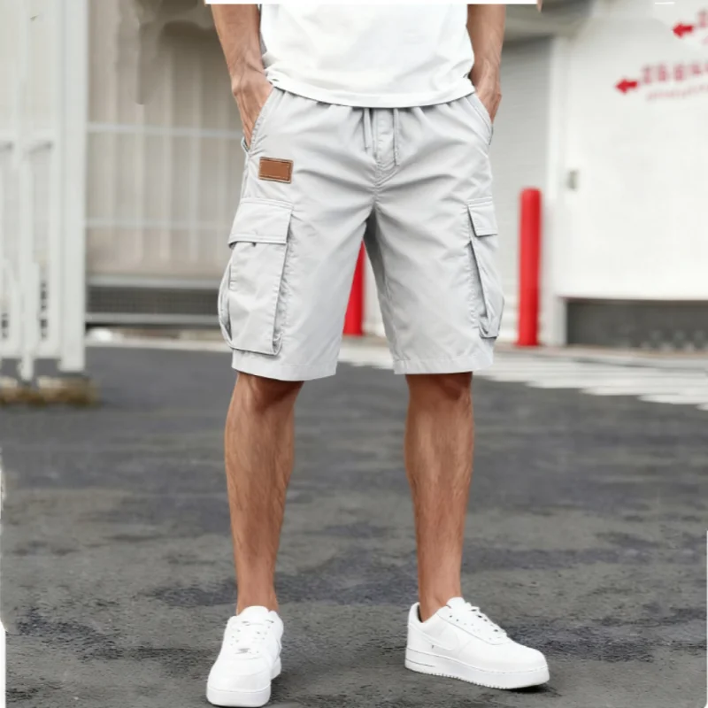 

2025 Summer men loose straight pants Casual multi-pocket Shorts pure color fashion Men Shorts drawstring daily cargo short pants