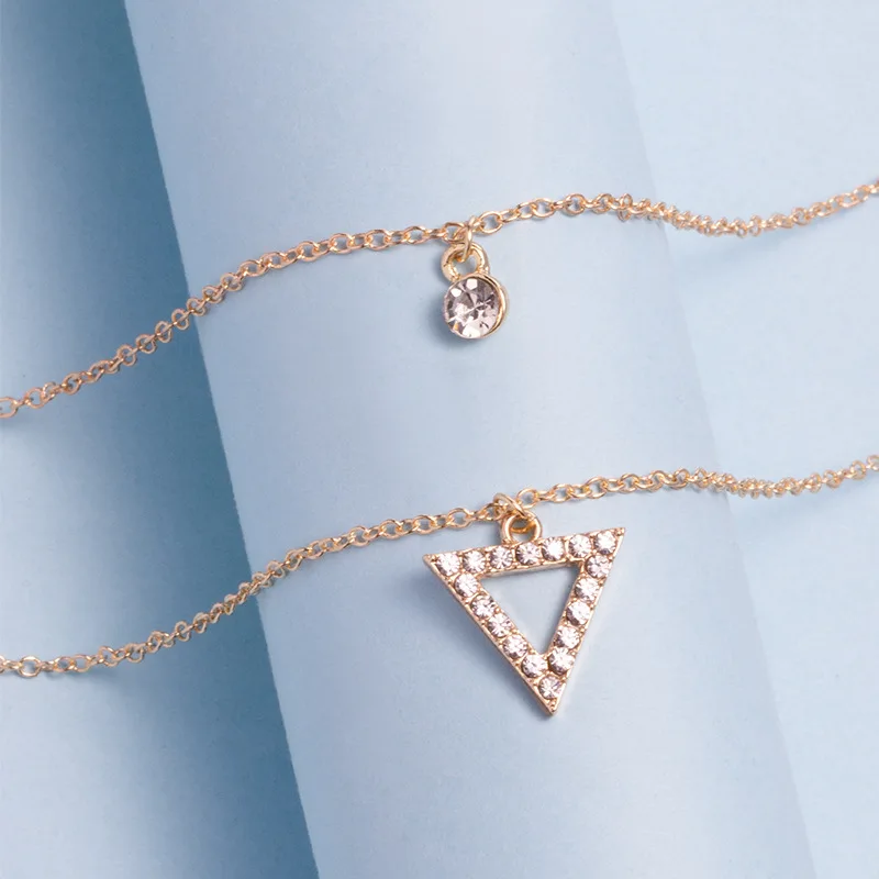 YWZIXLN-Collier pendentif triangle en cristal pour femme, bijoux tendance élégants, document doré, mode unique, vente en gros, N0310