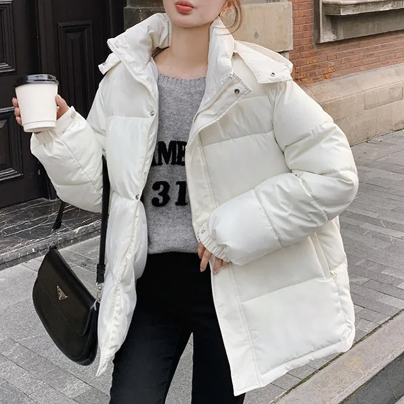 سترة نسائية شتوية عصرية بسحّاب وياقة واقفة وأكمام طويلة سترة نسائية بجيوب بلون سادة مع قلنسوة سترات نسائية