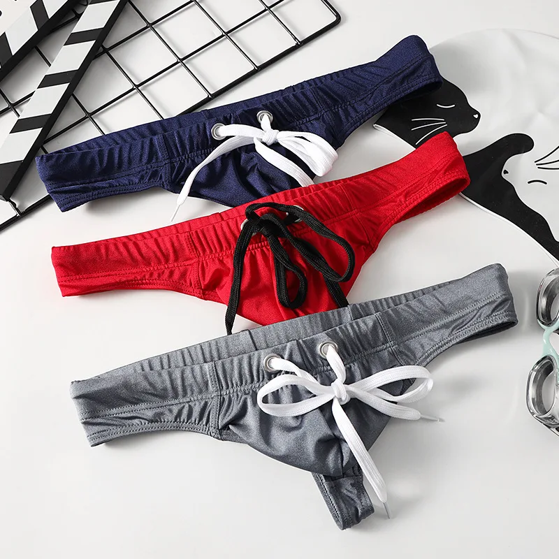 

Men's Swimming Trunks Solid Color Thongs Sexy Drawstring Quick Drying Ice Silk Breathable Swimwear T Back Bikini Beach Wear