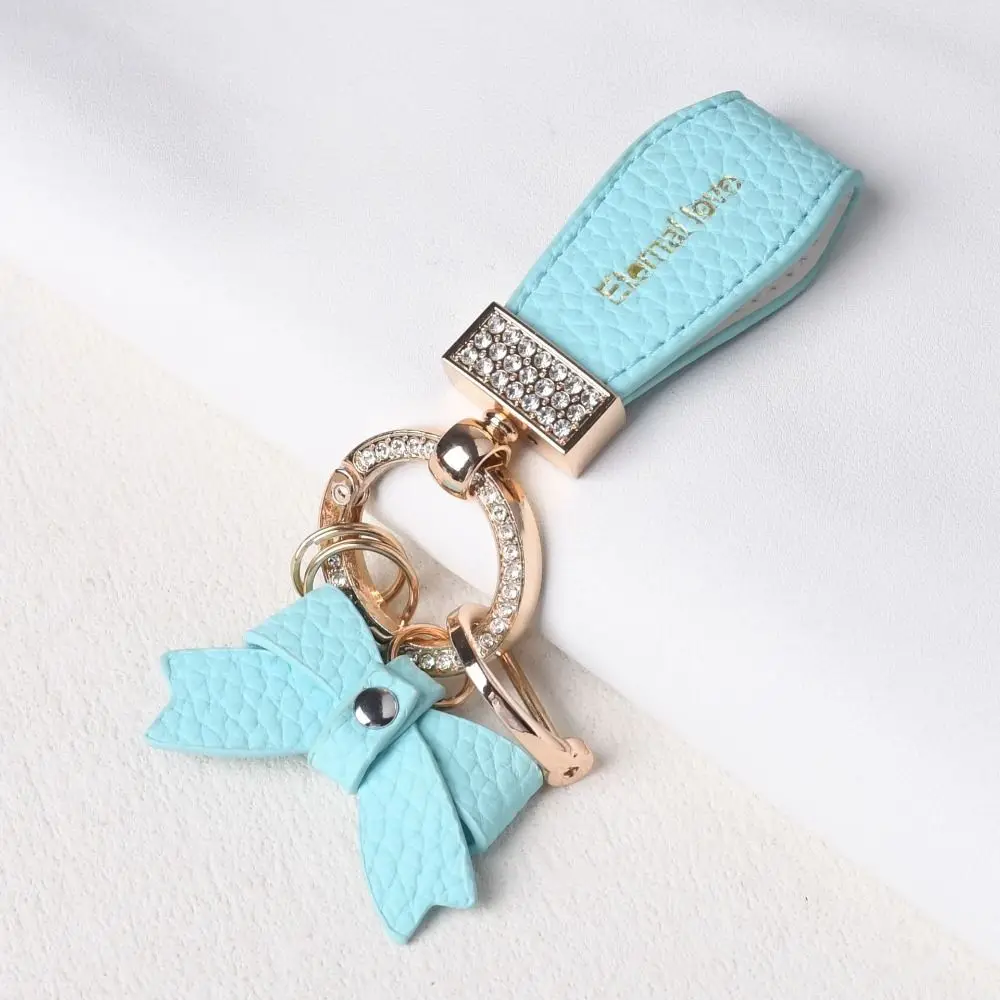 고급 천연 가죽 키홀더 여성 가방 패션 장식 무광 버클 가죽 자동차 키링 가방 참 펜던트