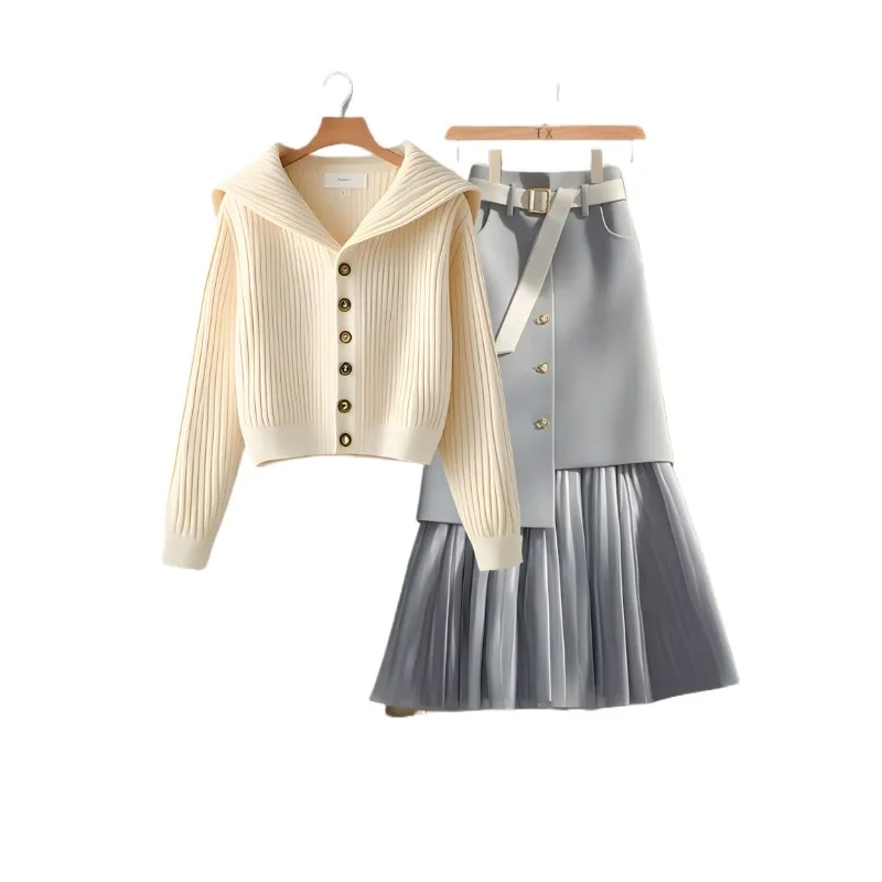 ชุดเสื้อคาร์ดิแกนถักนิตติ้งอเนกประสงค์สไตล์ต่างประเทศสุดชิคสำหรับฤดูใบไม้ผลิและฤดูใบไม้ร่วง พร้อมกระโปรงเข้าชุด ไม่ซ้ำใคร