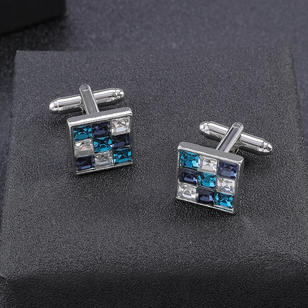 แฟชั่นแบรนด์คุณภาพสูงความแปลกใหม่หรูหราสีฟ้าสีเขียวสีขาว Rhinestone Cufflinks สําหรับบุรุษคริสตัลสีเงินเสื้อ Cuff Links