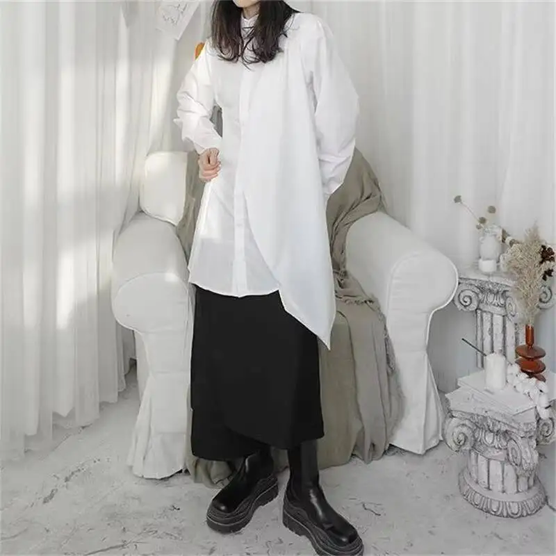 قميص نسائي طويل الأكمام نمط جديد شخصية عدم التماثل غير النظامية التفكيك موضة الهيب هوب الاتجاه قميص كبير الحجم