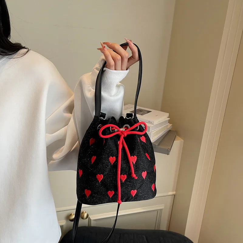 

2025 Hot Heart Embroidered Canvas Bucket Bag Drawstring Shoulder Purse Stylish Commuter Tote for Women