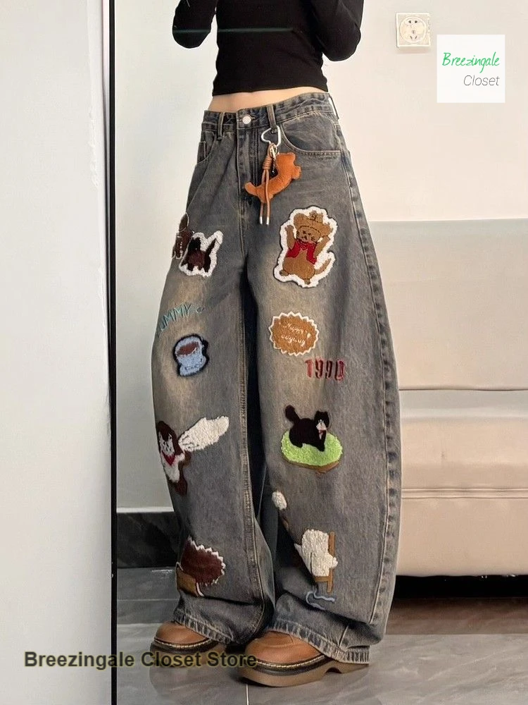 American cartoon plush embroidered wide-leg jeans women's autumn and winter new short tall street slim straight mop pants.