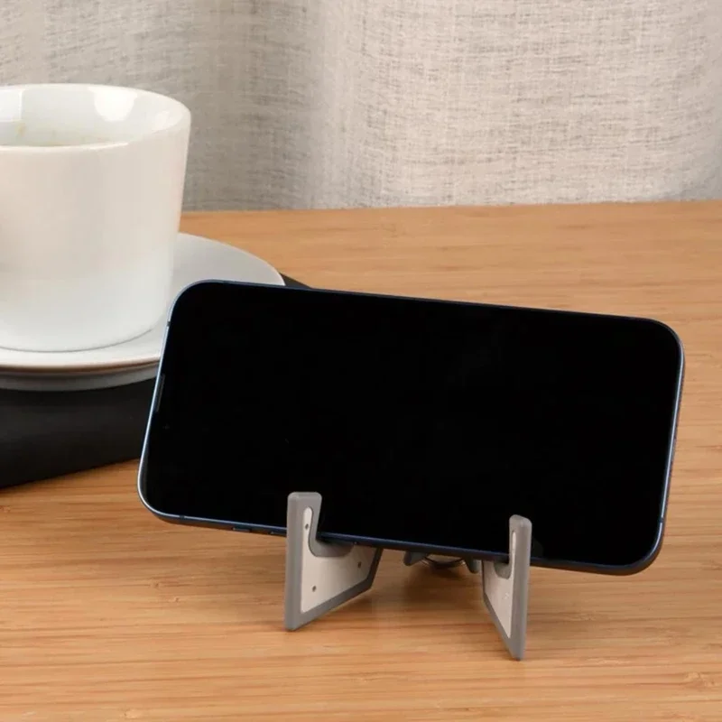 Universal Keychain Portable Cell Rack Desk Stand Holder for Phone Tablet PC Home