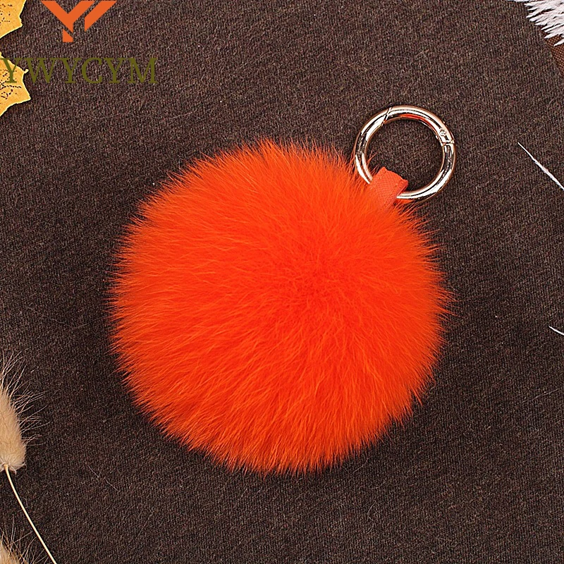 

2025 Real Fox Fur Keychain Natural Fur Pompom Ball Women Bag ornaments Pendant Luxury Car Key Ring Leather Strap Metal Ring Gift